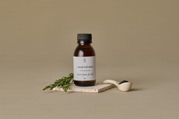 Basaè Naturals Herbal Infusion Hair Oil in amber glass bottle