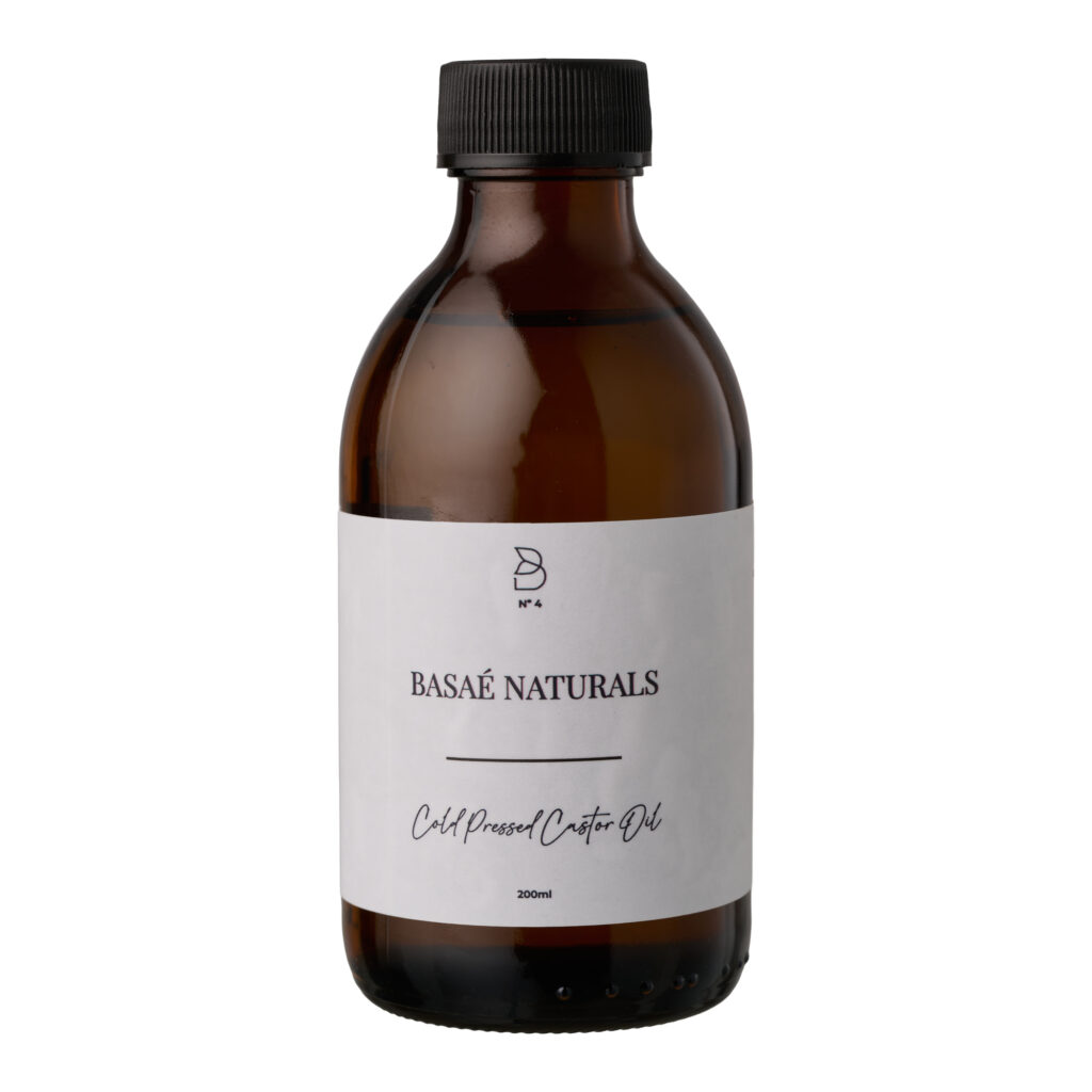 Basaè Naturals Cold Pressed Castor Oil in amber glass bottle